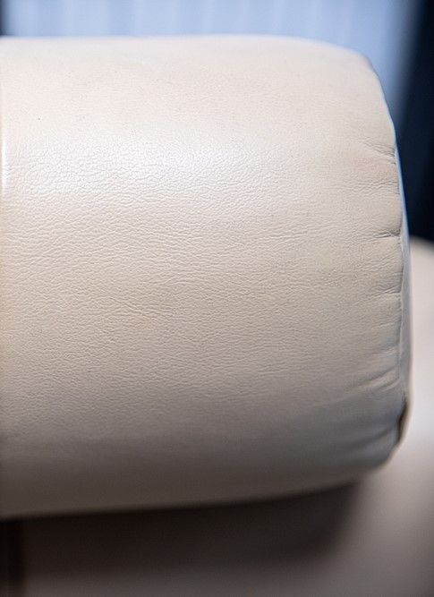 Car interior after valet service, showing a cushion with a clean and hygienic finish.