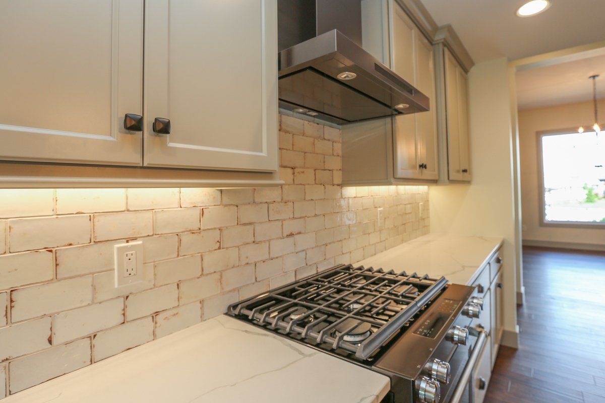 Hansman Custom Homes offers gas range and electric range stoves