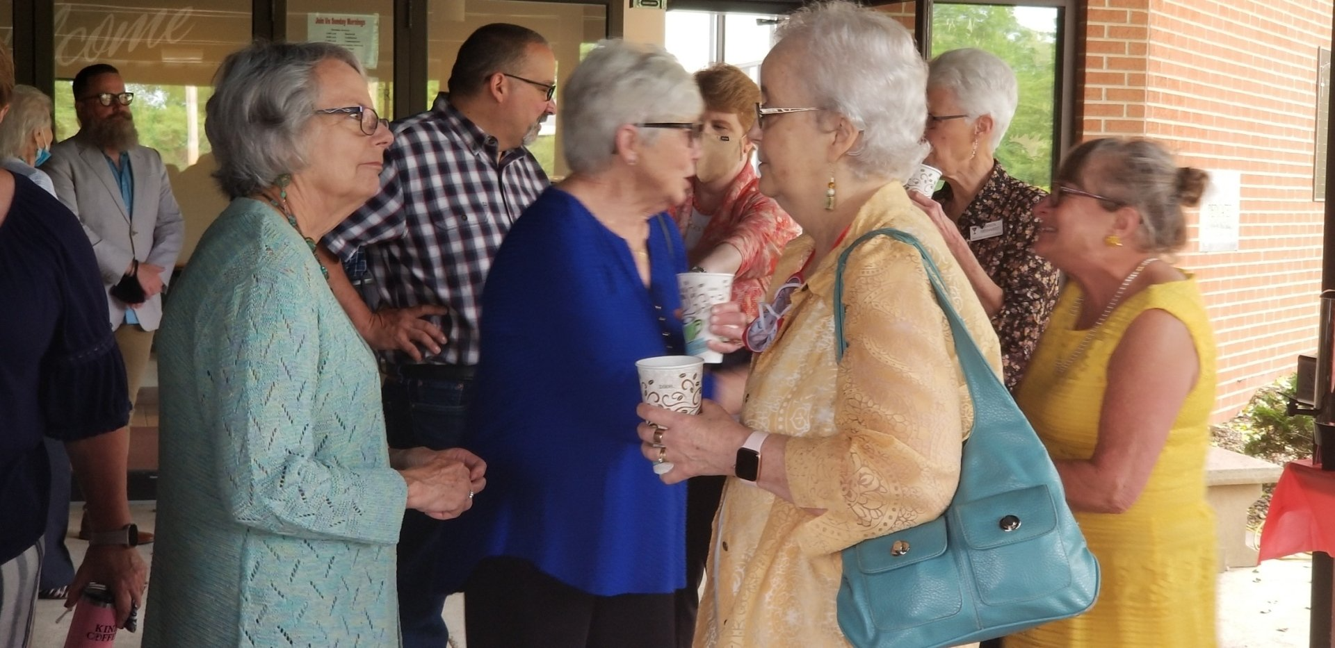 Broadway members chatting
