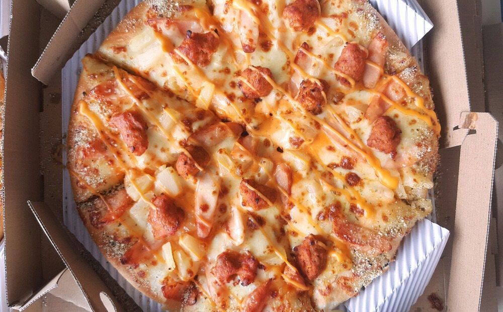 An Open Pizza Box Revealing A Hot, Cheesy Pizza With Various Toppings, Ready To Be Served And Enjoye — Pacific Palms Bowling Club In Smiths Lake, NSW