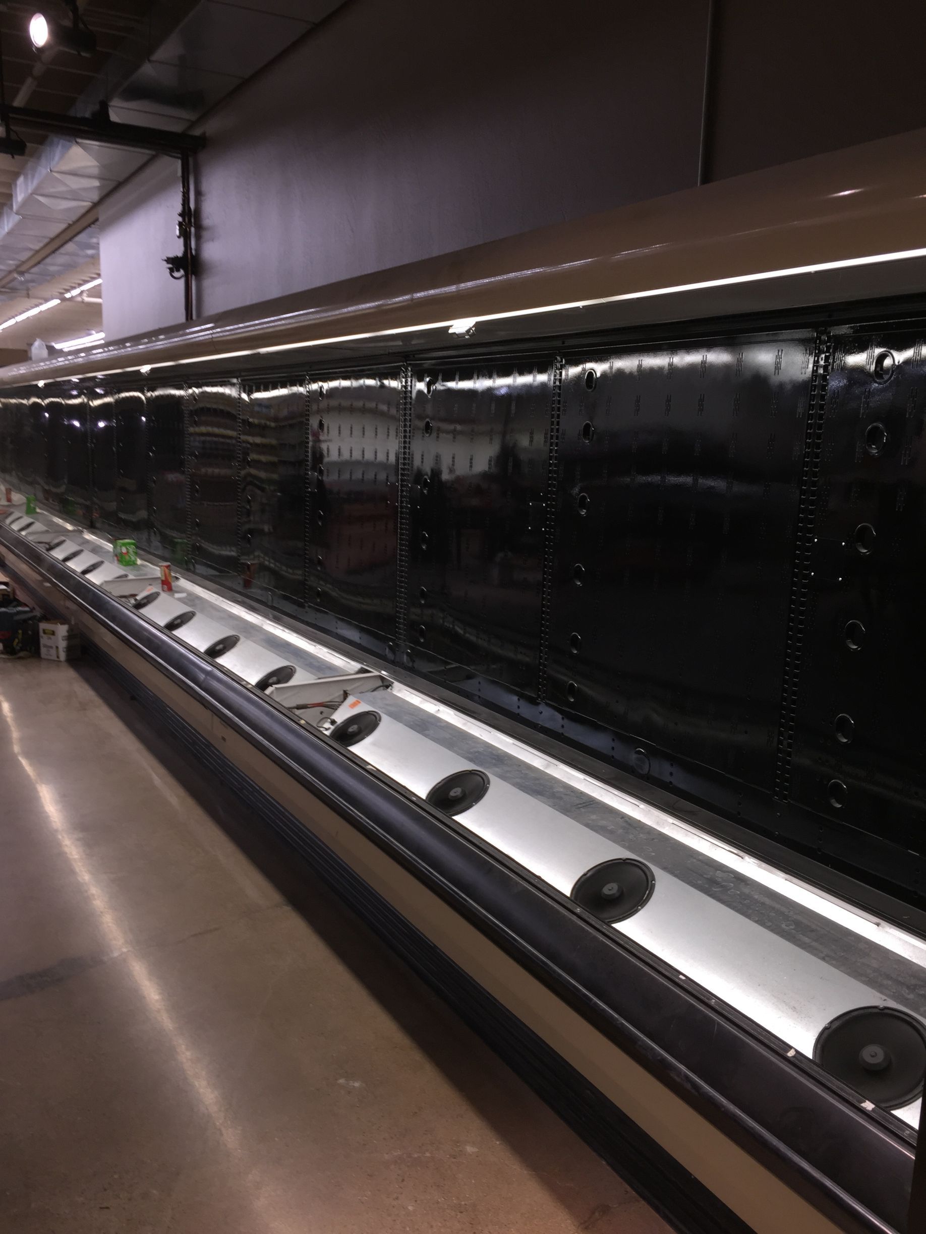 A long display case with a lot of records on it