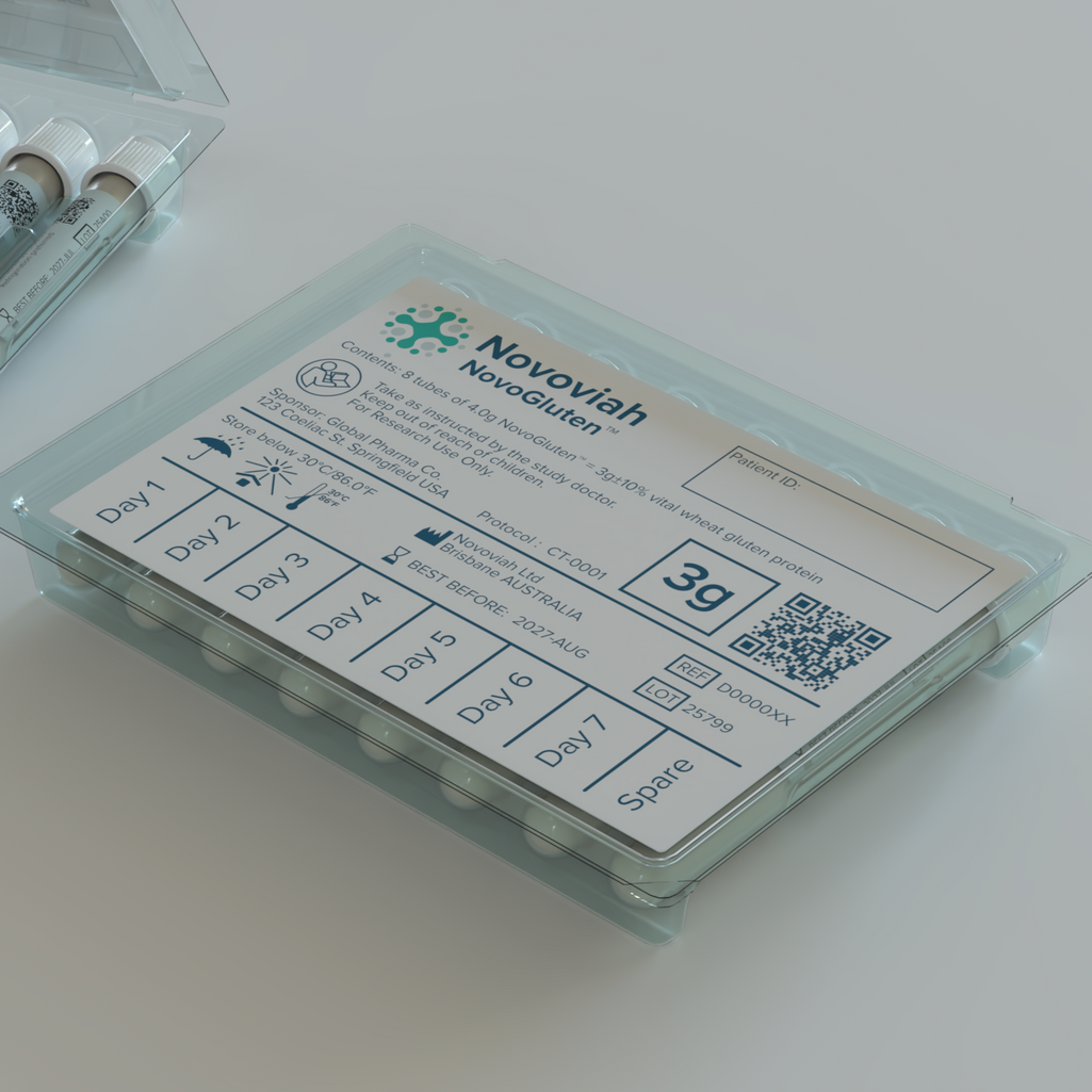 A clear plastic medicine box with a labeled prescription sheet on a light surface.