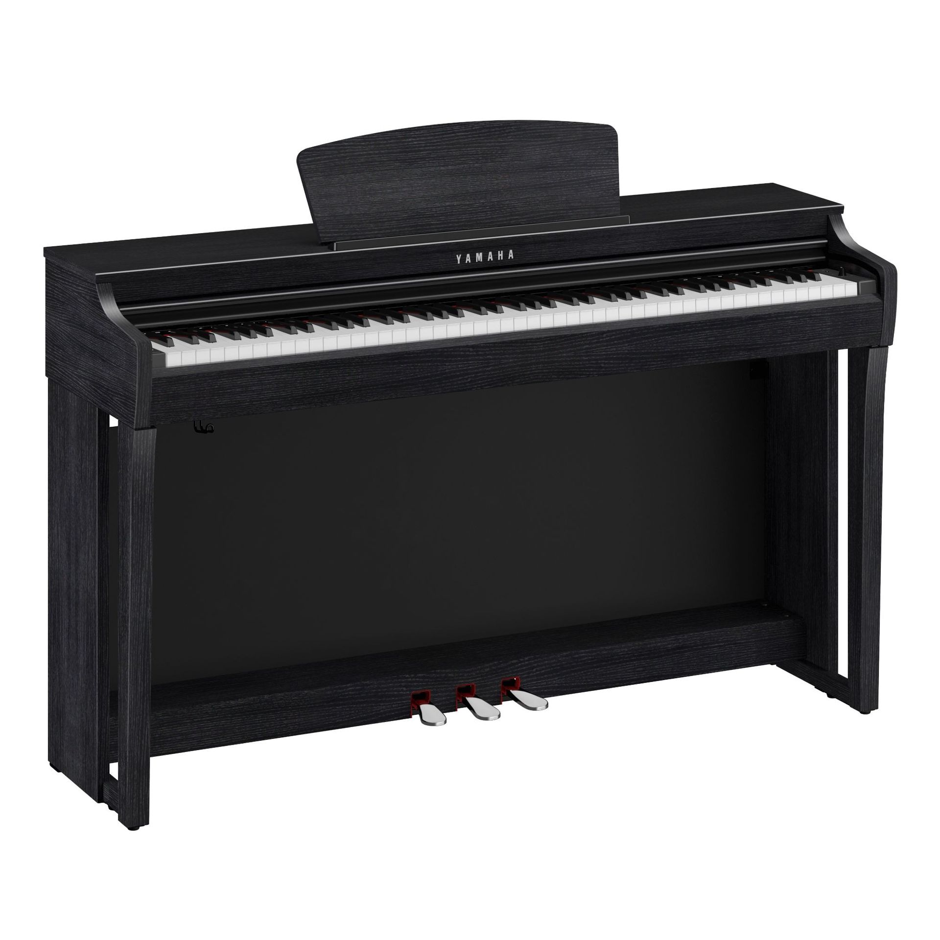 A black yamaha digital piano is sitting on a white surface.