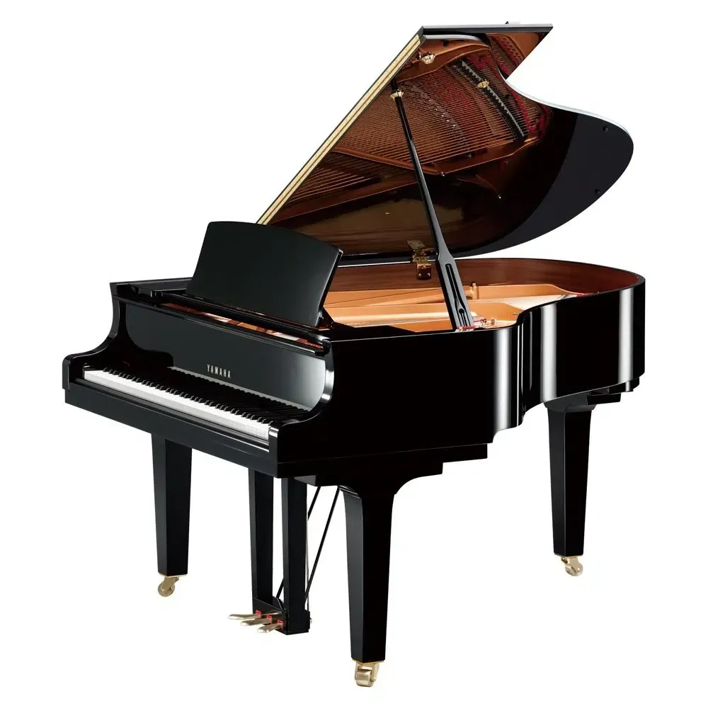 A black grand piano with the lid open on a white background.