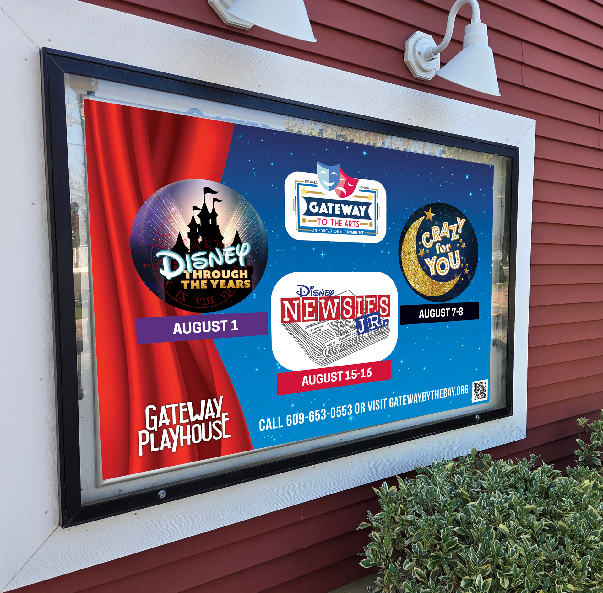 Outdoor signboard advertising Disney on the Main Street and Newsies at Gatelay Playhouse, blue and red background