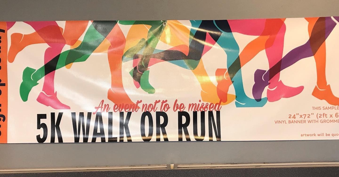 Colorful banner with abstract runners and the text “5K WALK OR RUN”