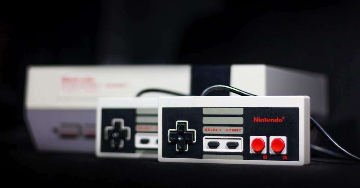 Two nintendo controllers are sitting next to each other