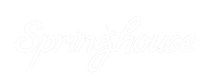 A white logo with a spoon and fork on a white background.