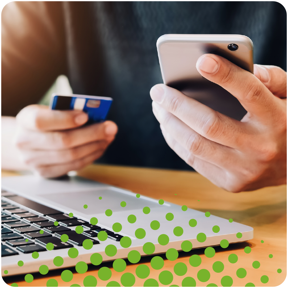 A person making a card payment on a phone