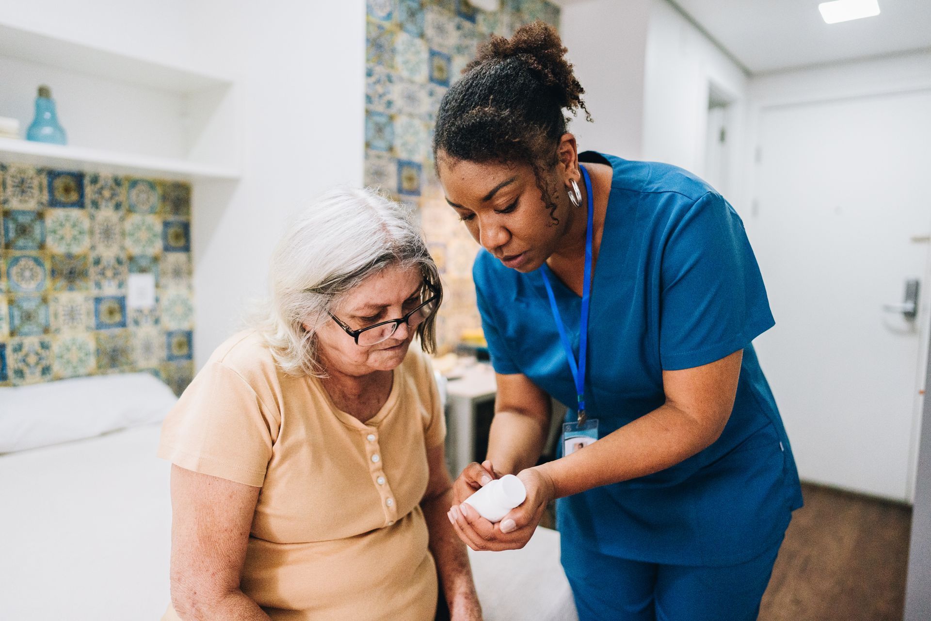 Registered nurse providing in-home clinical care to an elderly client