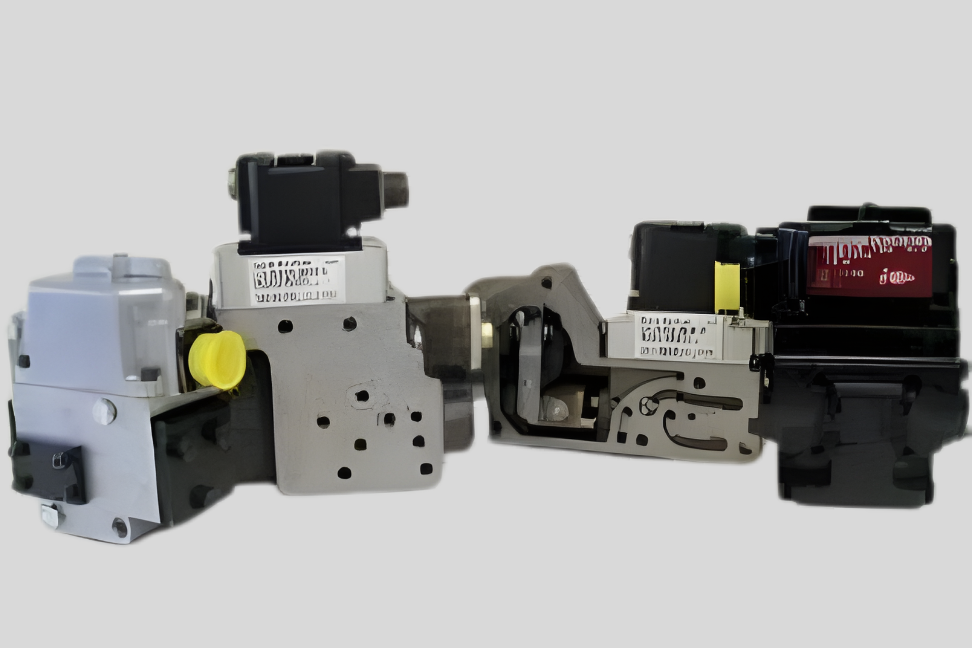 Three industrial machine components connected in a row on a white background