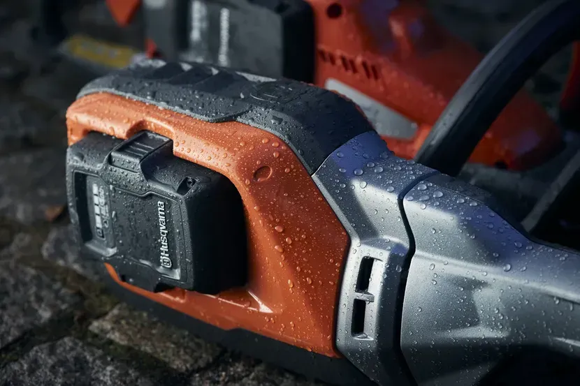 Close up Of a Husqvarna Chainsaw with A Battery — CBS Chainsaw & Brushcutter Specialists - HUSQVARNA in Telegraph Point, NSW
