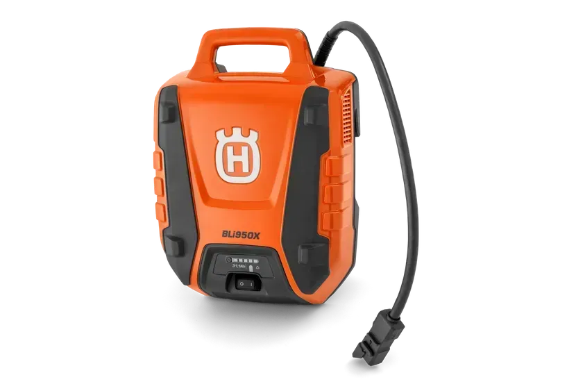 An Orange and Black Device with A Cord Attached to It — CBS Chainsaw & Brushcutter Specialists - HUSQVARNA in Wauchope, NSW