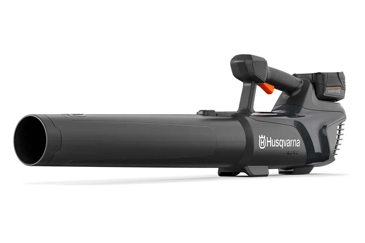 A Husqvarna Leaf Blower Is Sitting on A White Surface — CBS Chainsaw & Brushcutter Specialists - HUSQVARNA in Comboyne, NSW