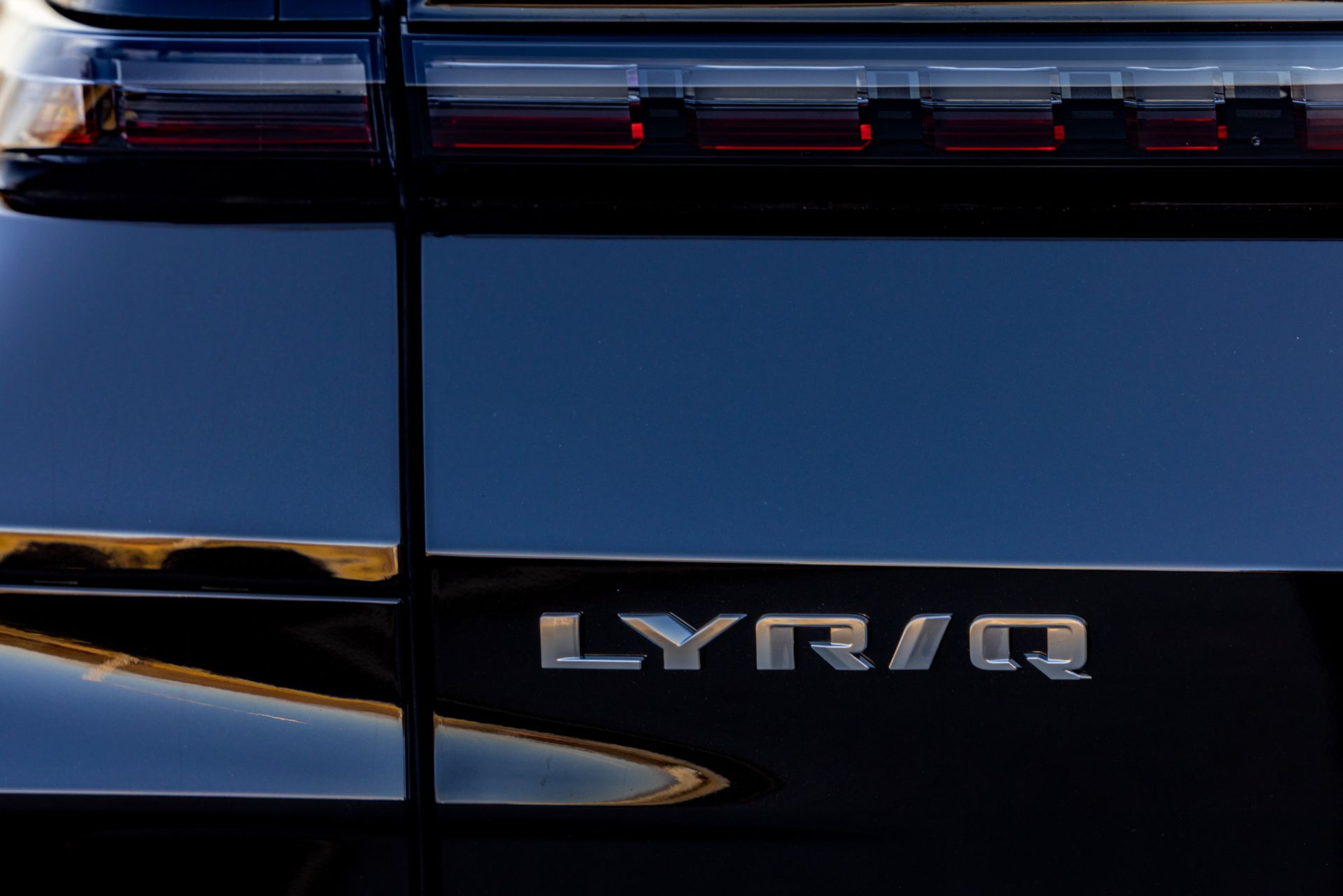 A close up of the back of a black lyriq