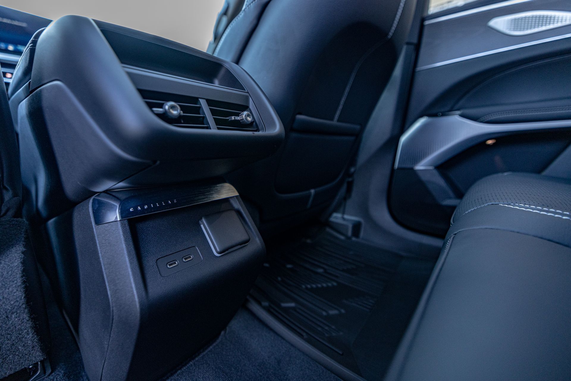 A close up of the back seat of a car.