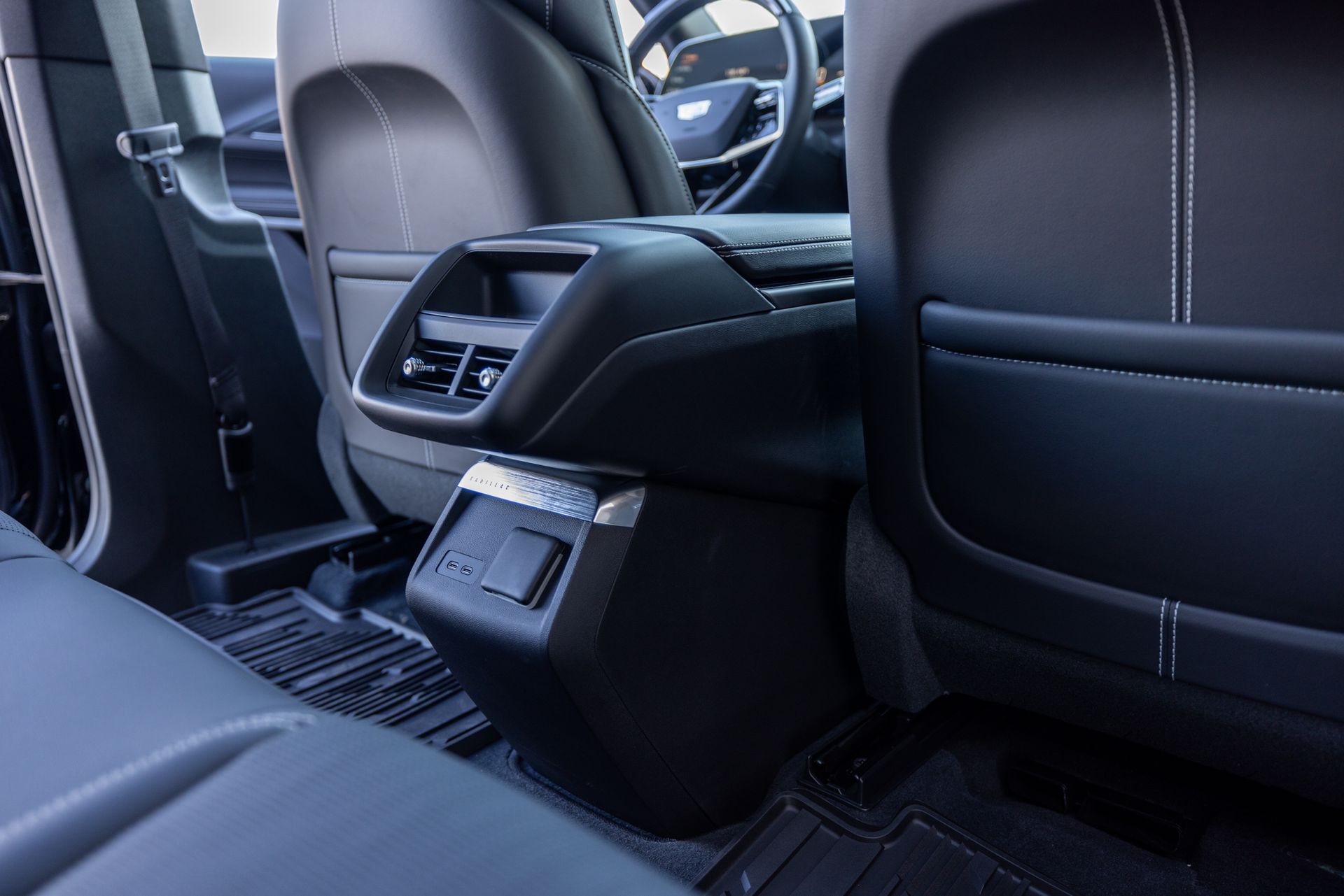 A close up of the back seat of a car.