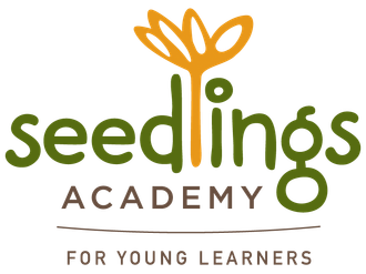Seedlings Academy logo with green and orange sprout, “For Young Learners” subtitle