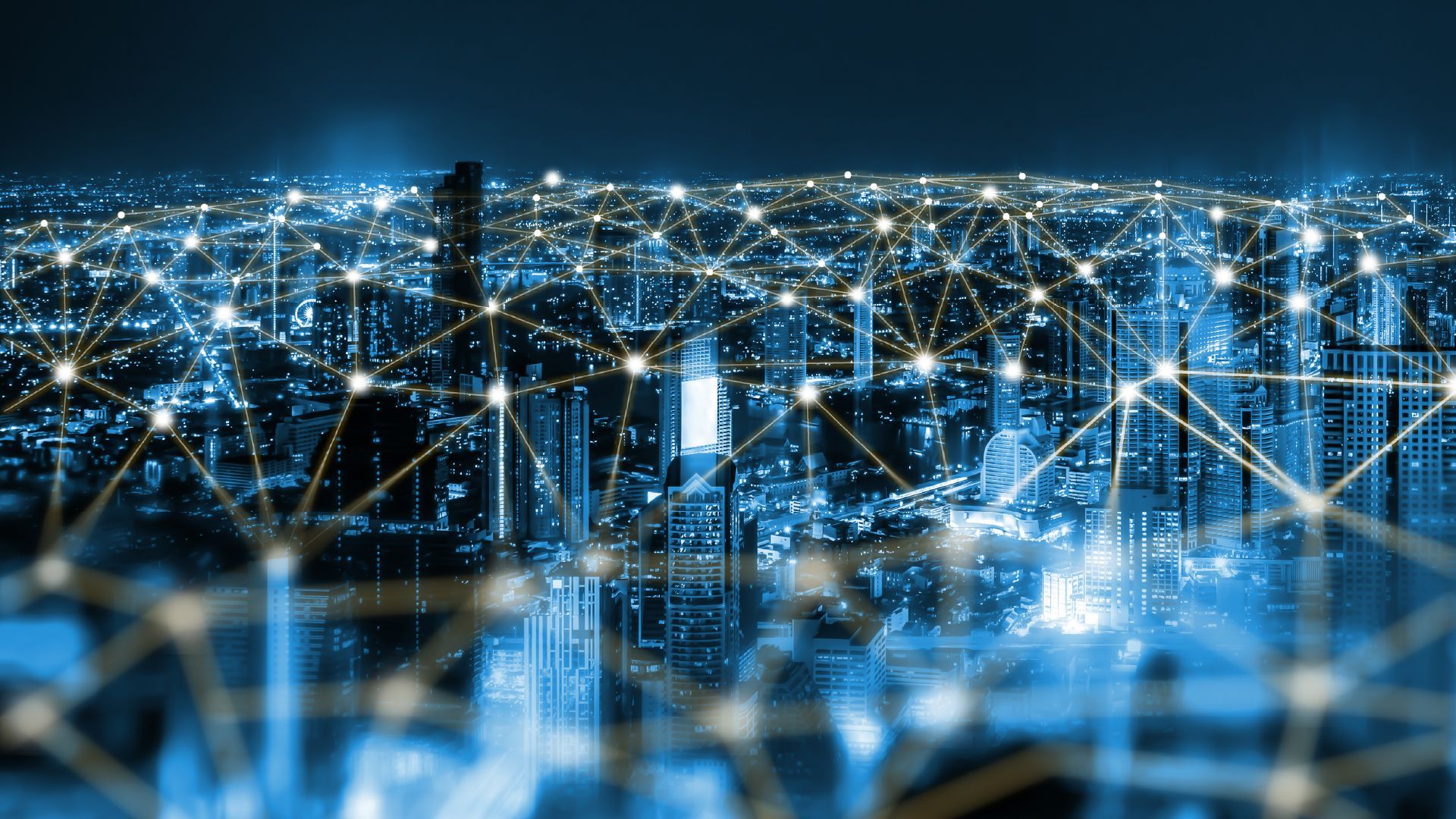 A city at night with a lot of lights connected to each other.