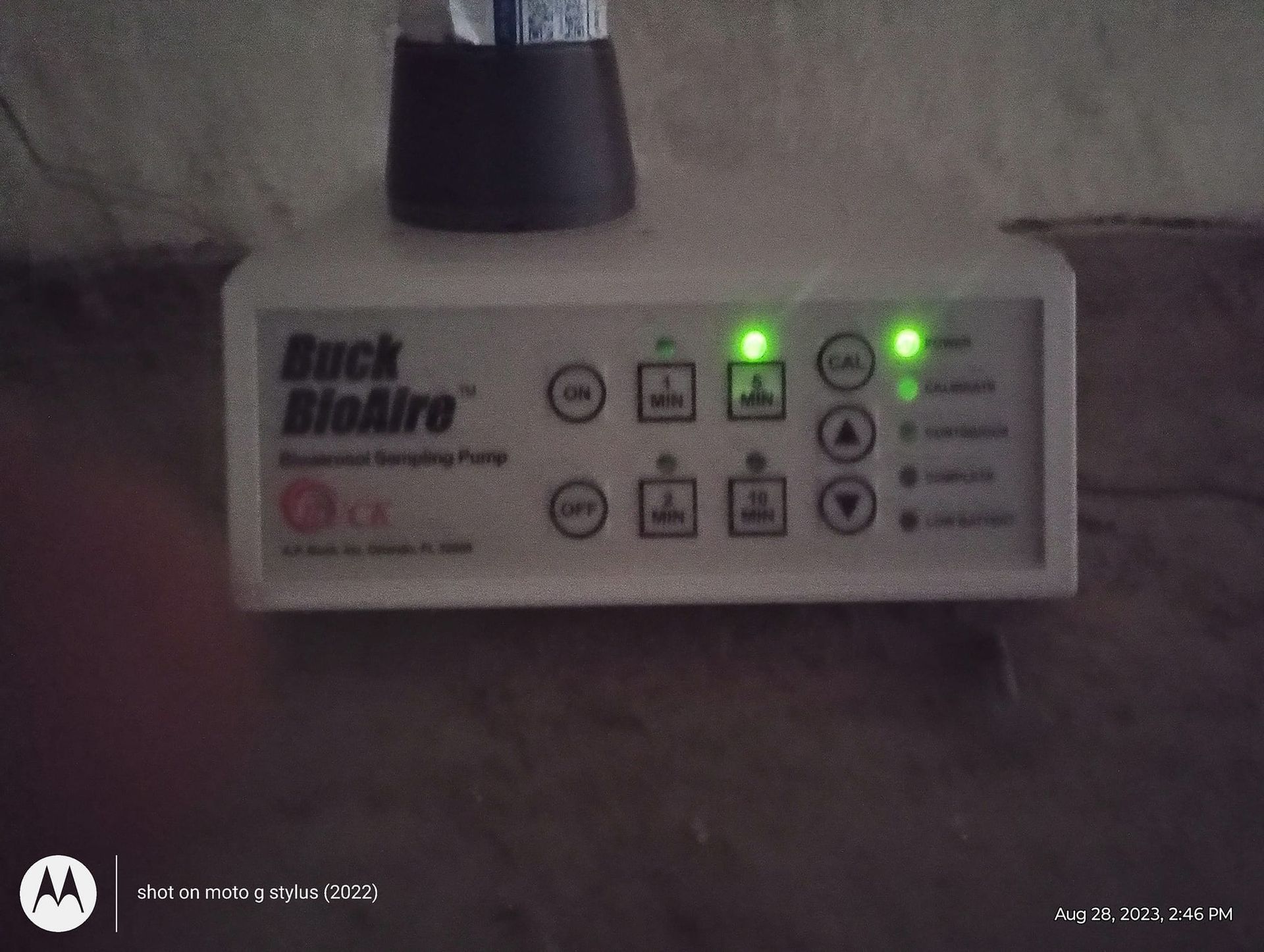 A buck bioaire device is plugged into a wall