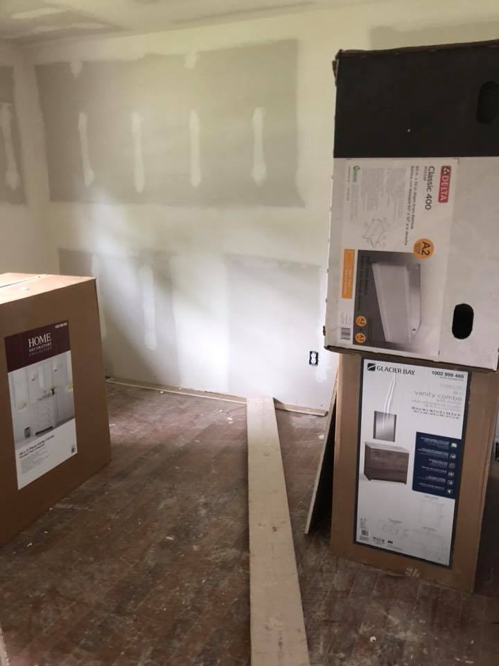 A room with boxes stacked on top of each other