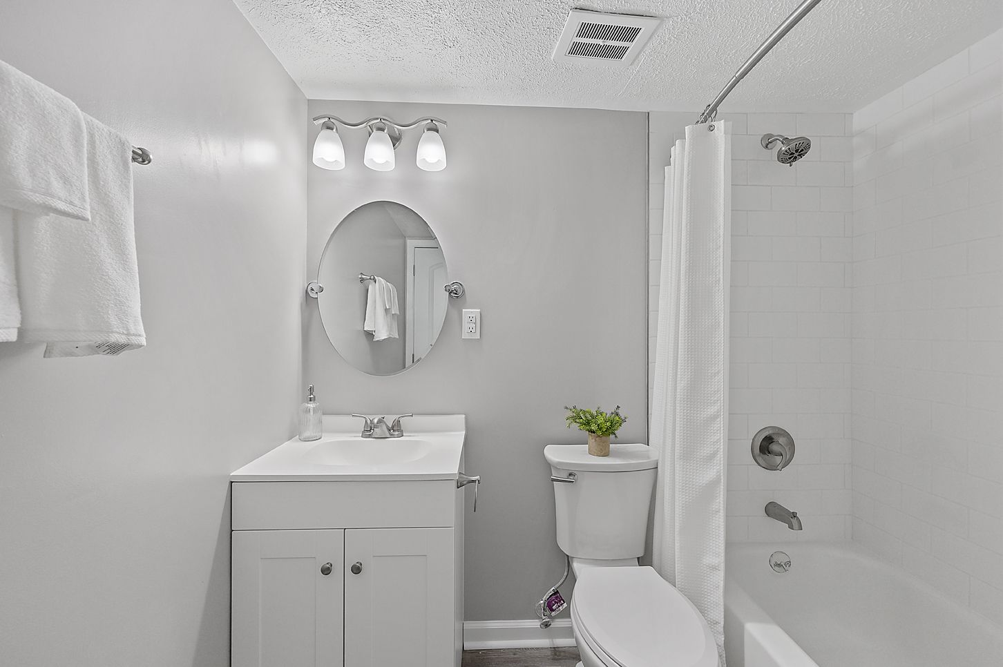 an image of the updated bathroom and vanity