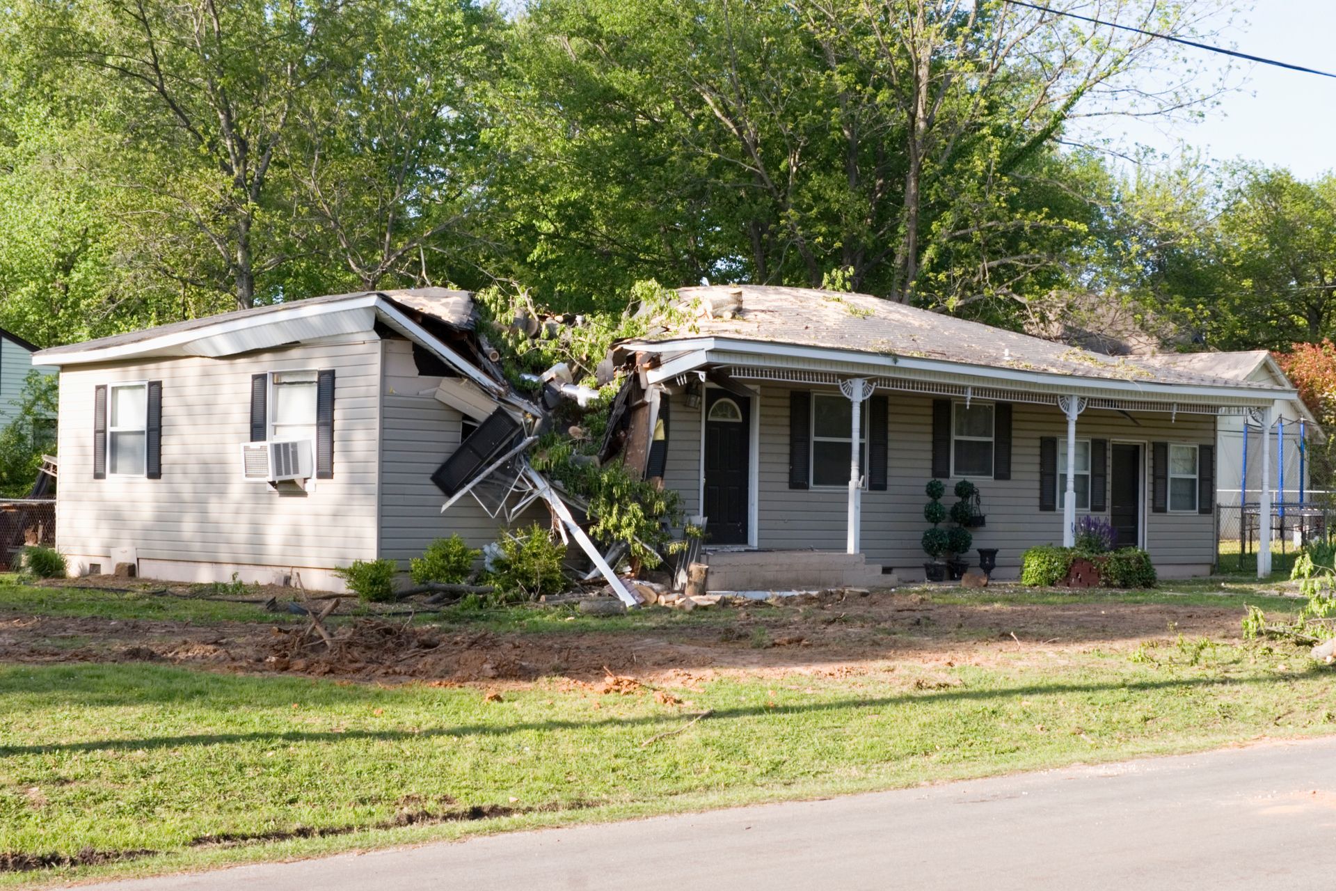A house that has been damaged by a tornado.