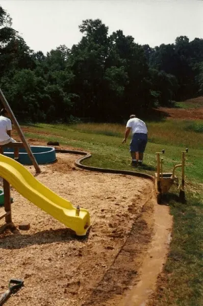 Slides and Man — Glade Hill, VA — Creative Curbs