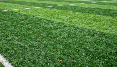 Professional Artificial Grass in Kent, WA installed on a sports field with durable, realistic synthetic turf.