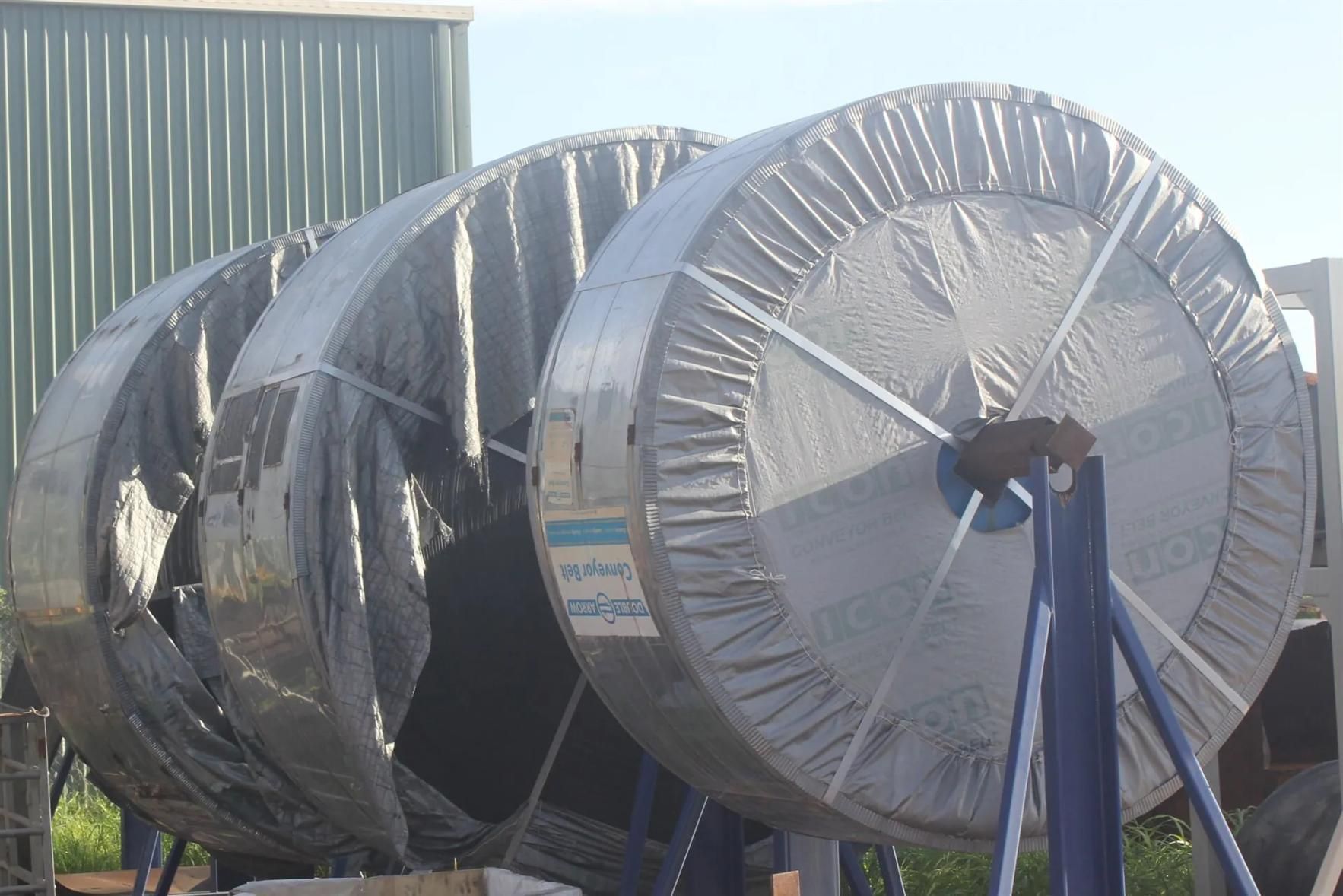 A Bunch Of Stainless Steel Pipes Are Wrapped In Plastic — HardRok Engineering Pty Ltd In Mount Isa, QLD