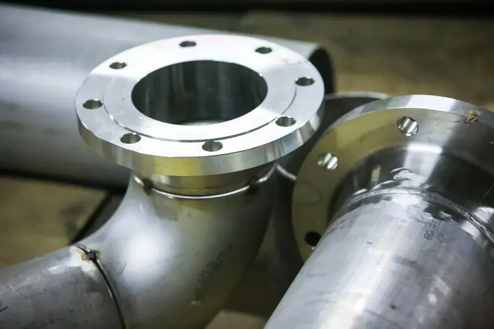 A Close Up Of A Metal Pipe With A Flange On It — HardRok Engineering Pty Ltd In Mount Isa, QLD