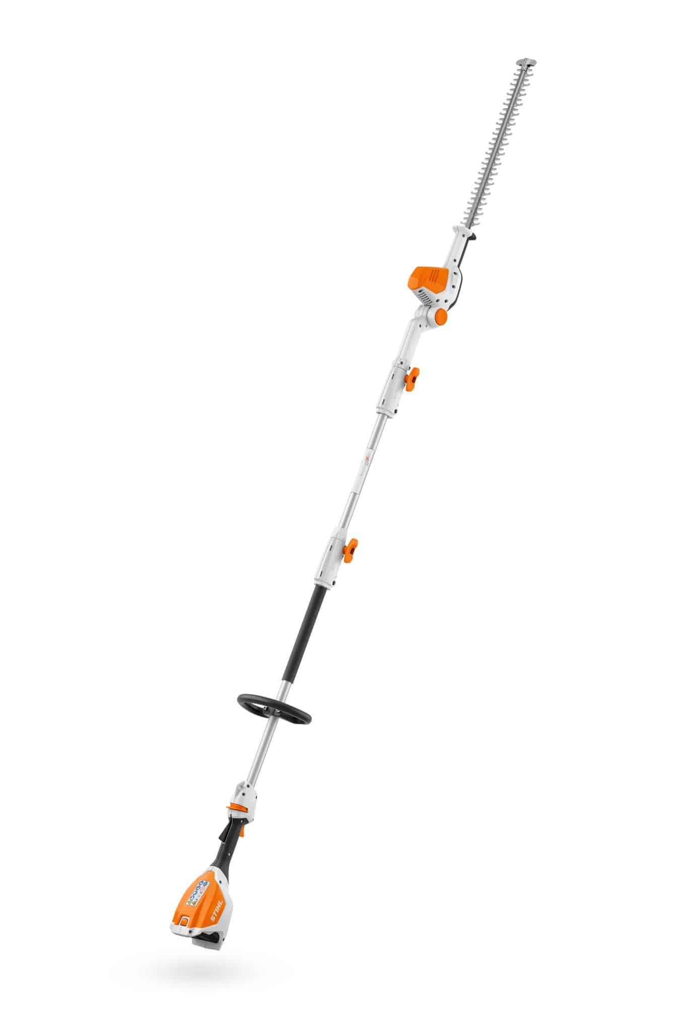 A Man is Cutting a Hedge With a Hedge Trimmer — Hamblin Hire in Albury, NSW