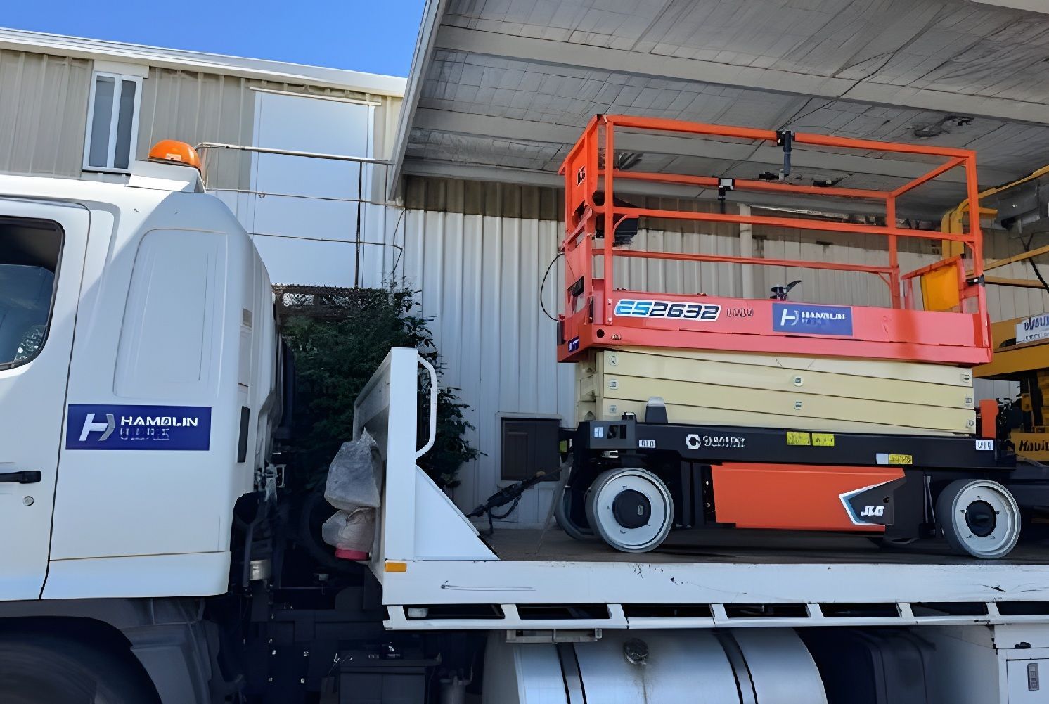 A Scissor Lift On A Delivery Truck For Elevated Work