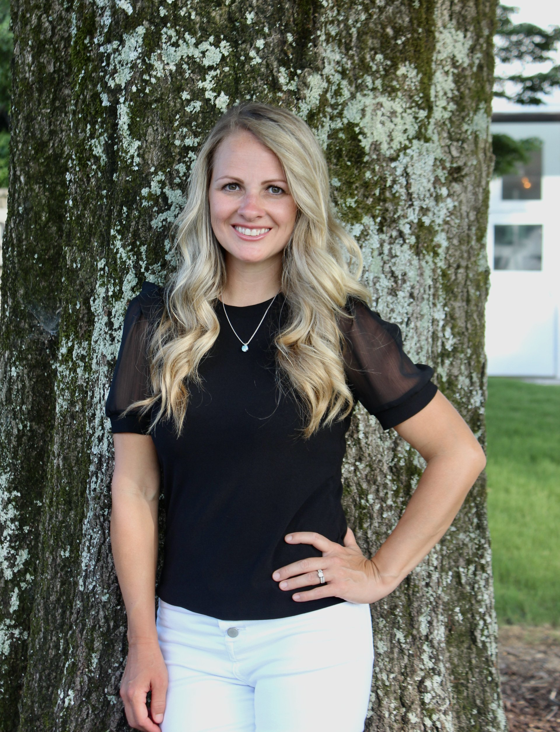 portrait of Alisha Lensch owner of GrassyGram Yard Cards