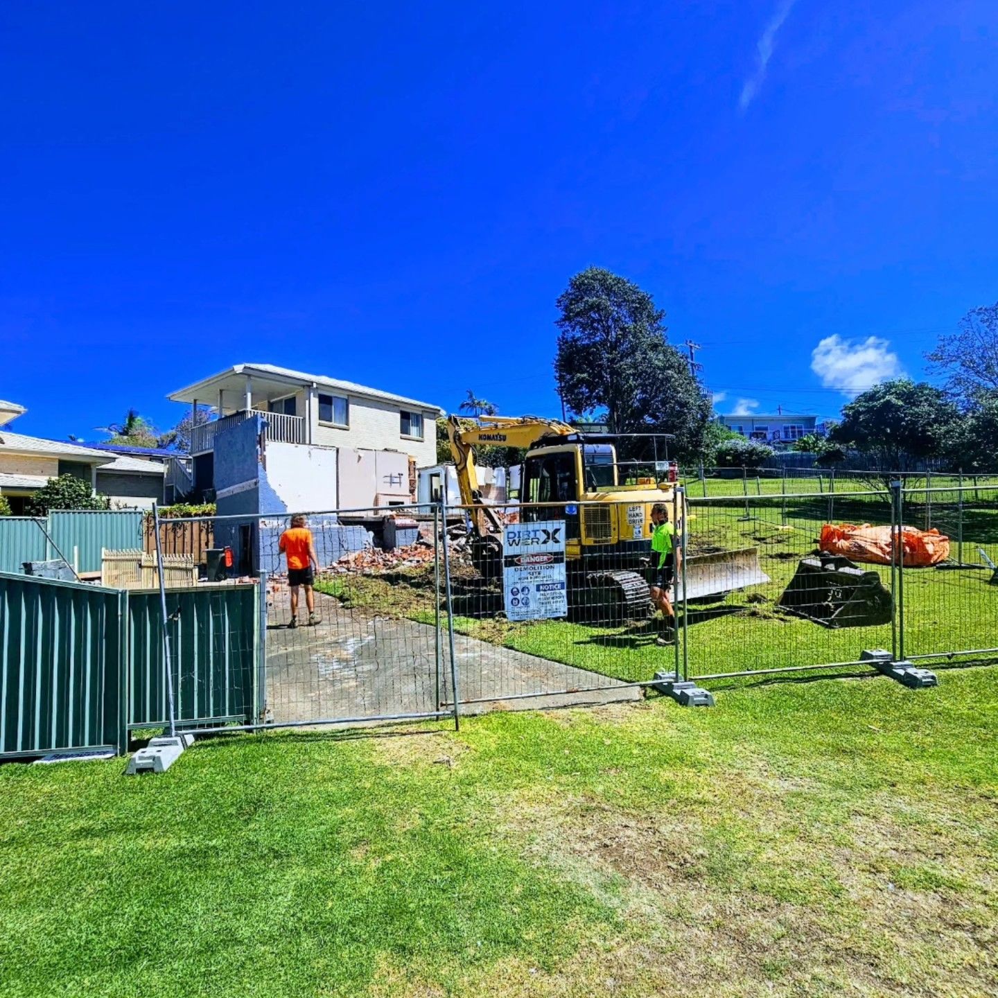 Demolition Site Fenced Beside A White House — Dirt Werx in Fingal Bay, NSW