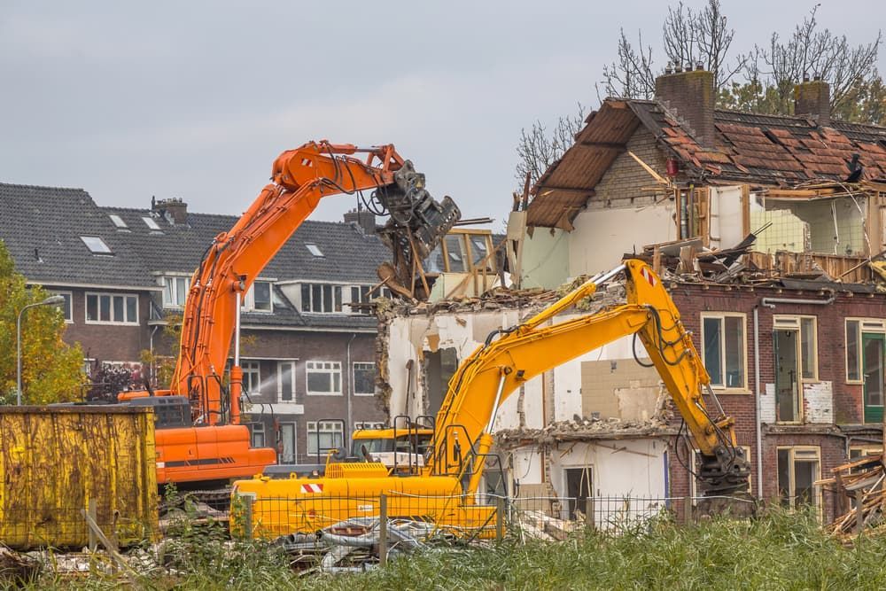 Two Excavators Demolish a House. One Orange, One Yellow — Dirt Werx in Ulladulla, NSW