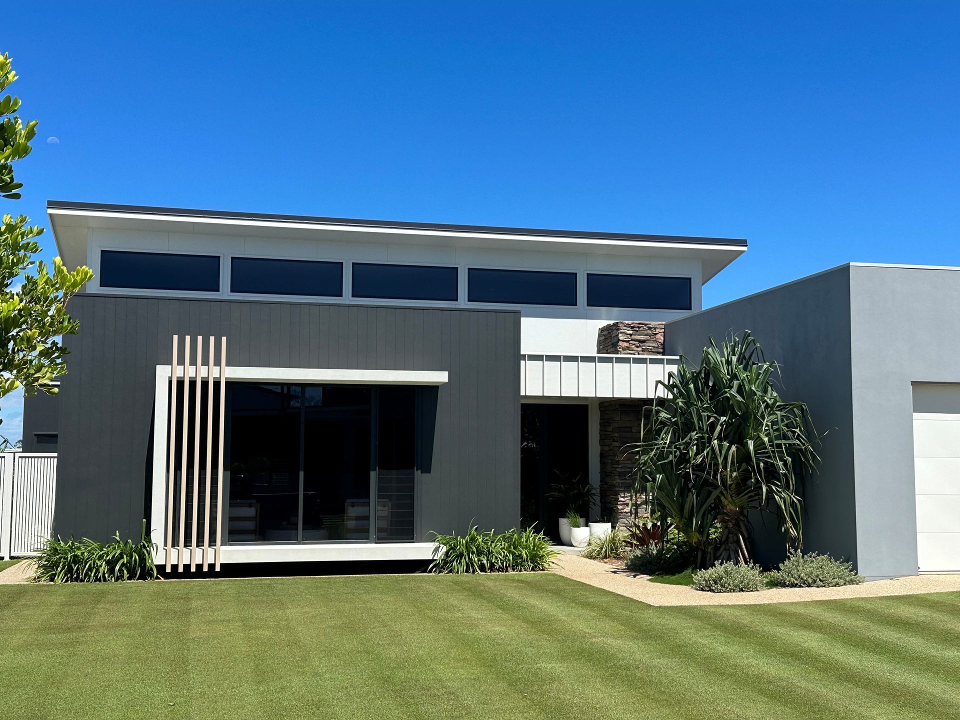 Modern House Exterior with Dark and Light Grey Walls — Gatley Building Design in Bundaberg East, QLD