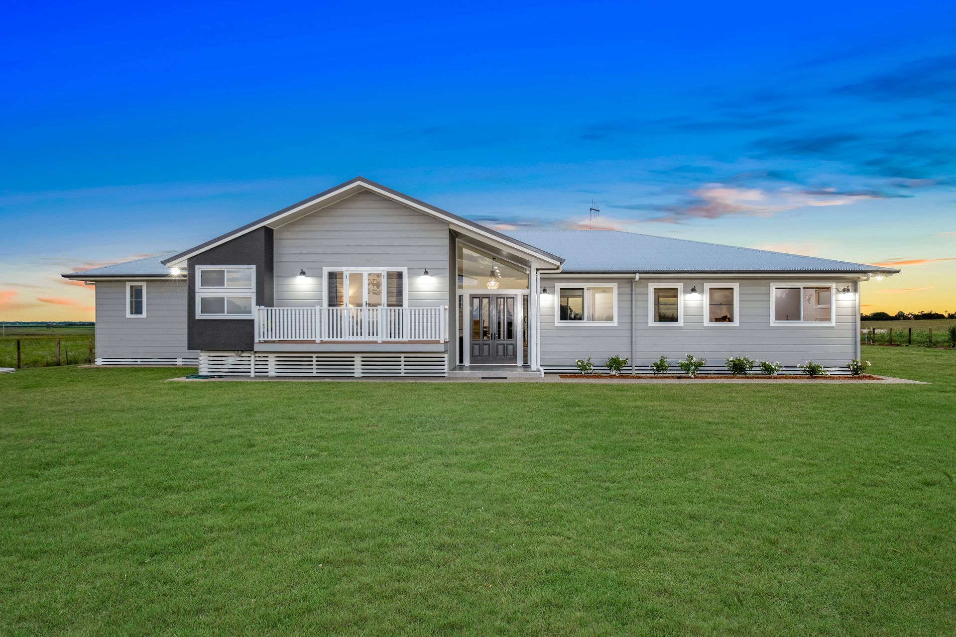 Single-Story Grey House with White Trim  — Gatley Building Design in Bargara, QLD