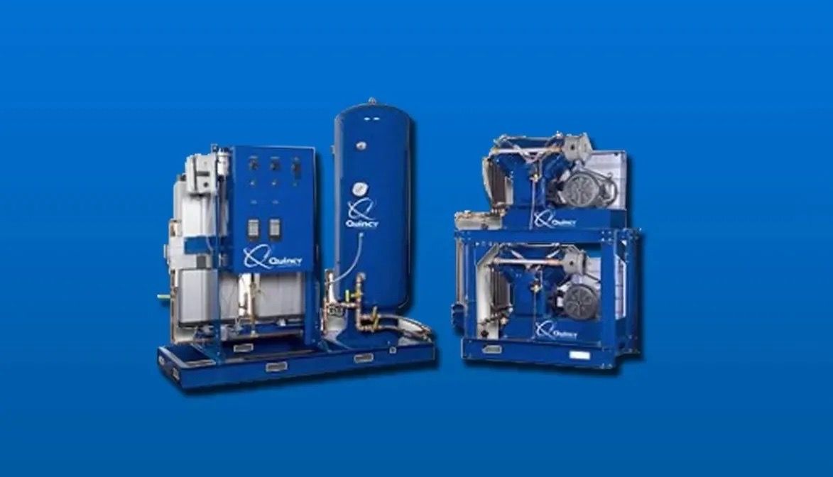 A group of compressors are sitting next to each other on a blue background.