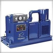 A blue machine is sitting on top of a white surface.