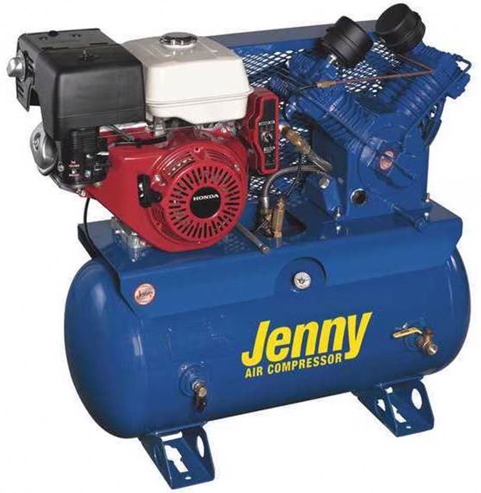 Close-up of an industrial air compressor featuring connecting pipes, hoses, and valves.