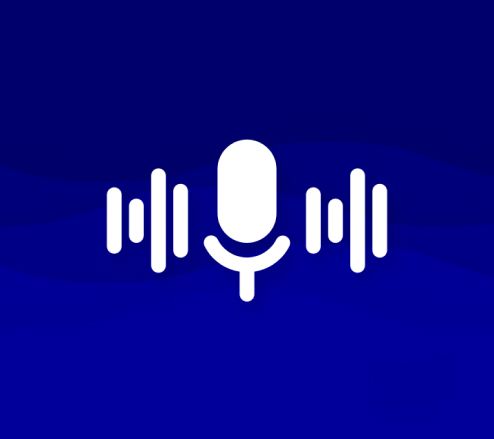 A white microphone icon on a blue background.