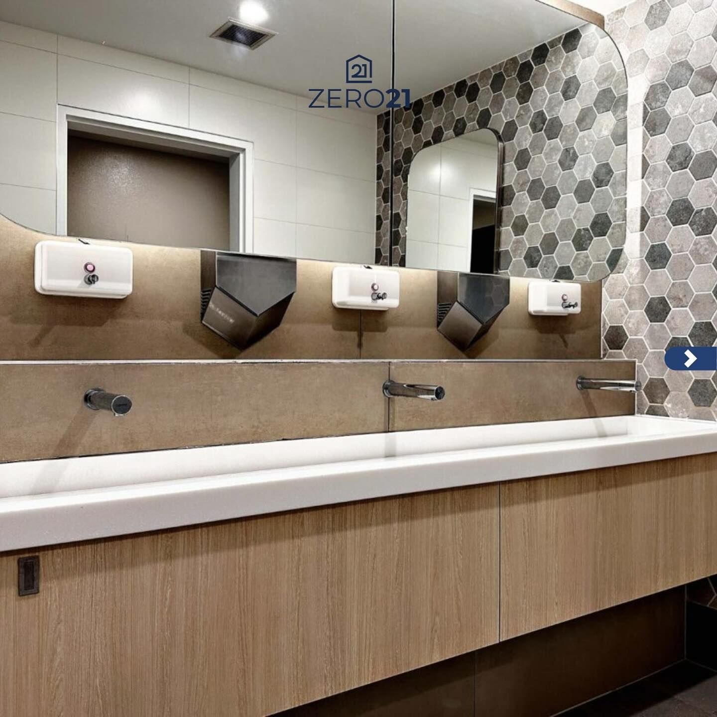 Public Restroom with Wood-Tone Cabinets— Zero 21 Fit-Outs & Joinery: Kitchen Renovation Gold Coast in Tweed Heads, QLD