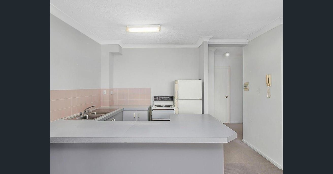 Empty Kitchen with Light Gray Countertops — Zero 21 Fit-Outs & Joinery: Kitchen Renovation Gold Coast in Tweed Heads, QLD