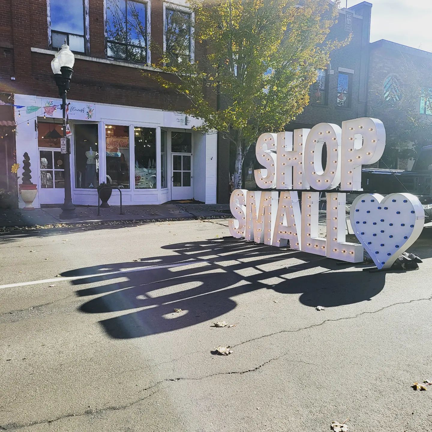 Shop Small sign in front of Painted Pieces and Bloom & Flourish in Downtown Klamath Falls.