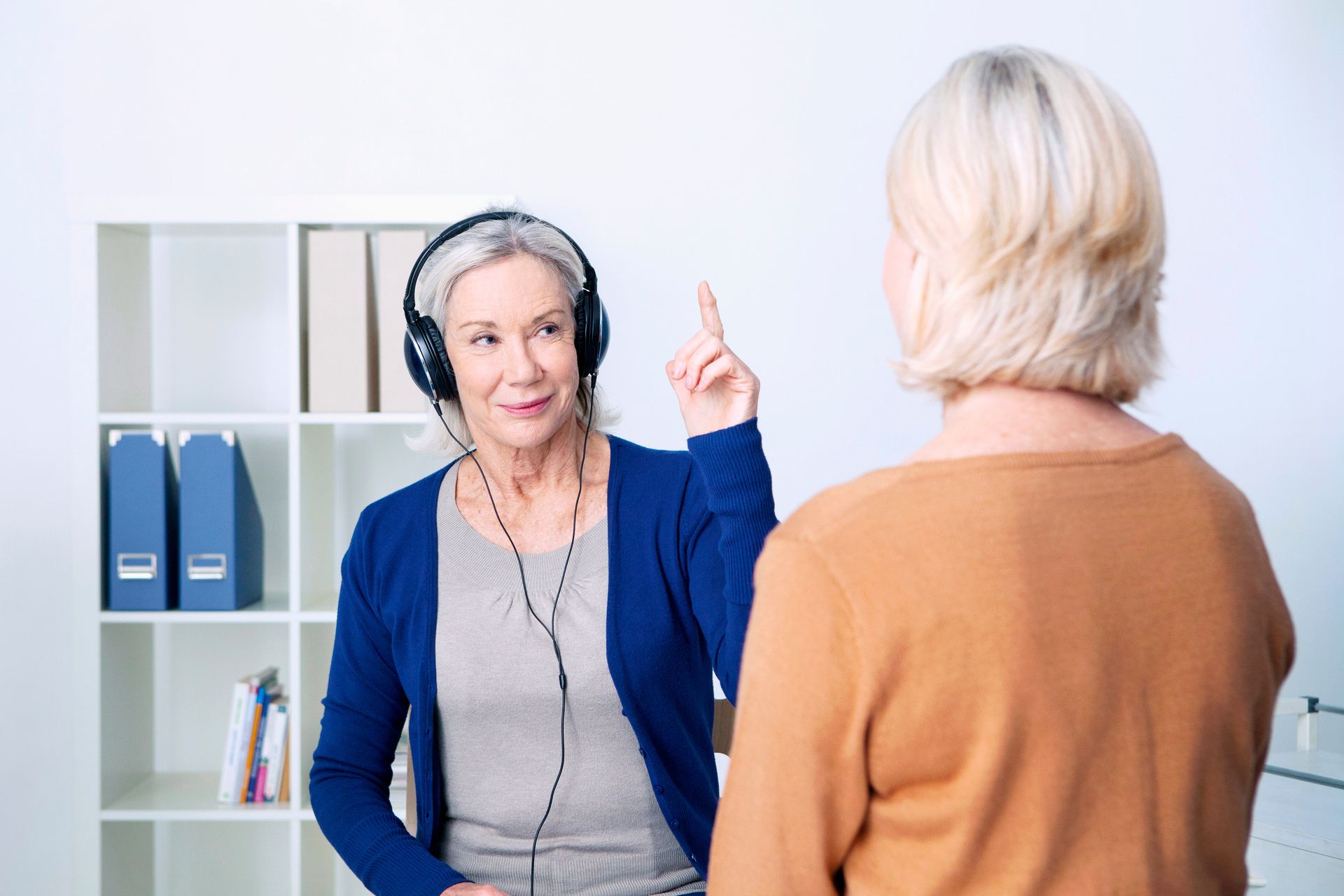 Senior woman undergoing a hearing test.