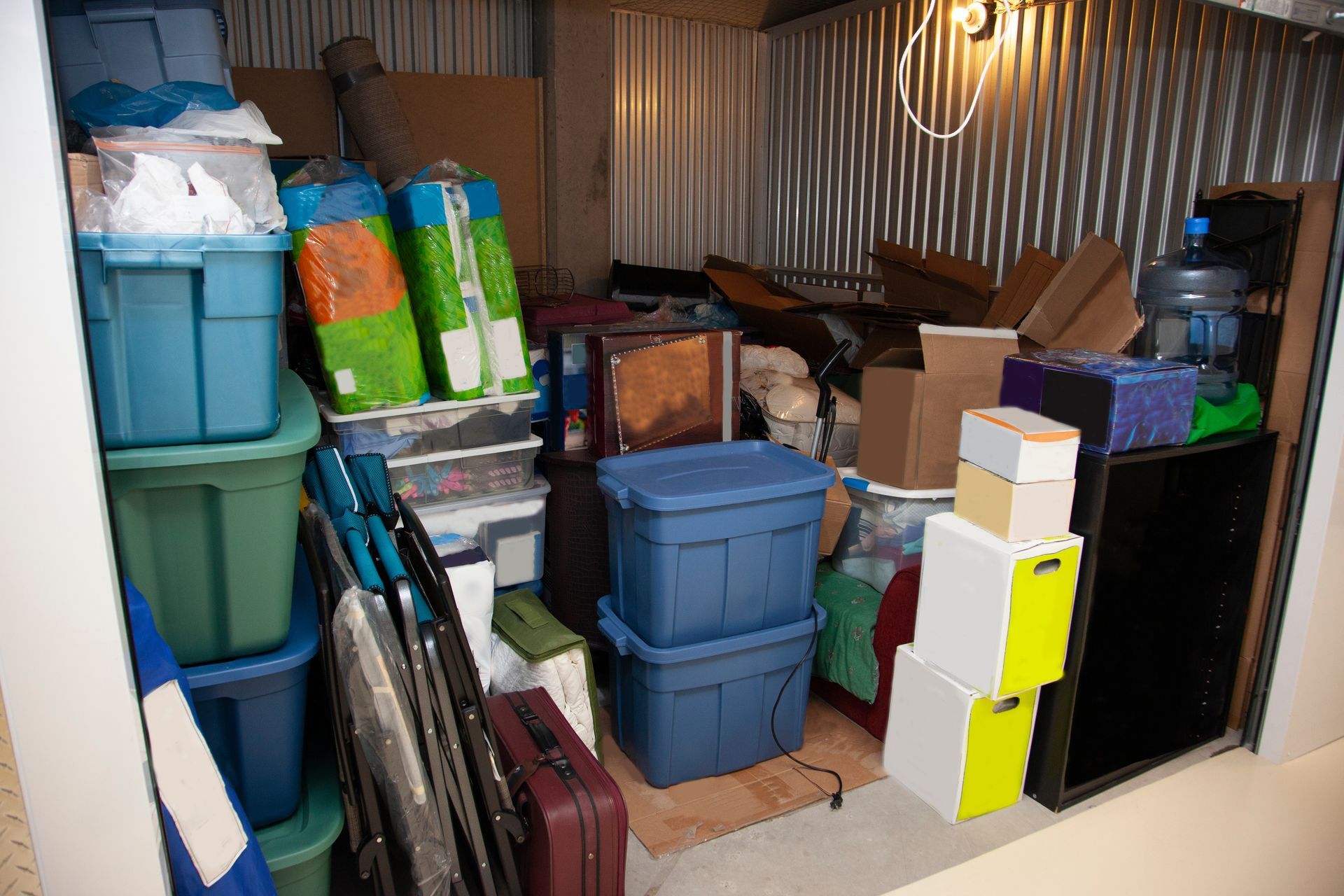 A storage unit filled with boxes. A storage unit filled with boxes.