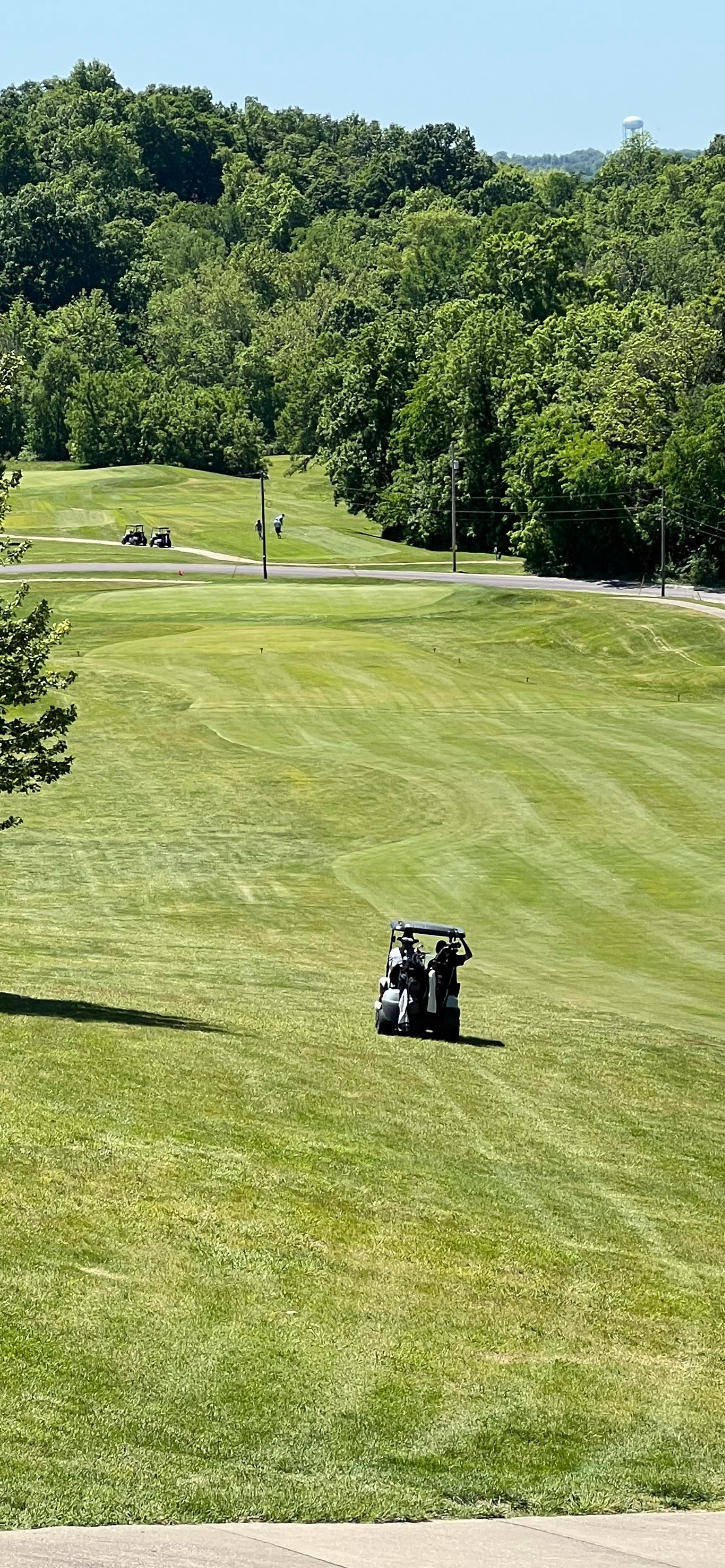 Group of golfers gathered near the first tee at Railwood Golf Club