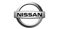 A close up of a nissan logo on a white background.