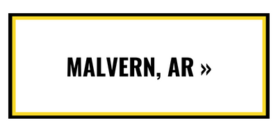 A rectangular button with a white background and yellow border containing the black text 